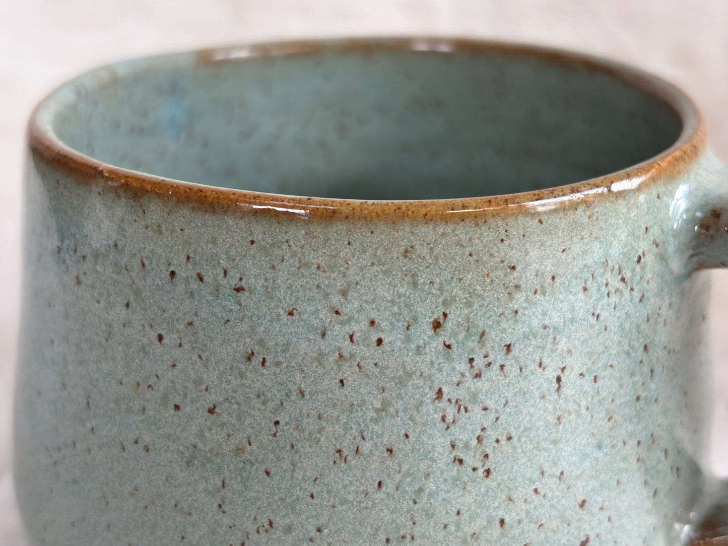 Large speckled soft blue mug