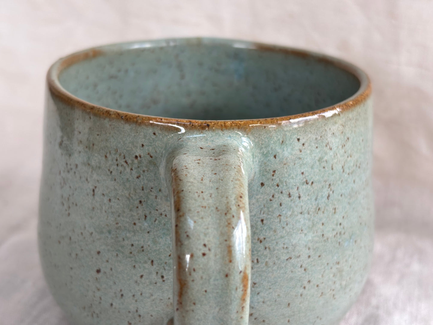 Large speckled soft blue mug